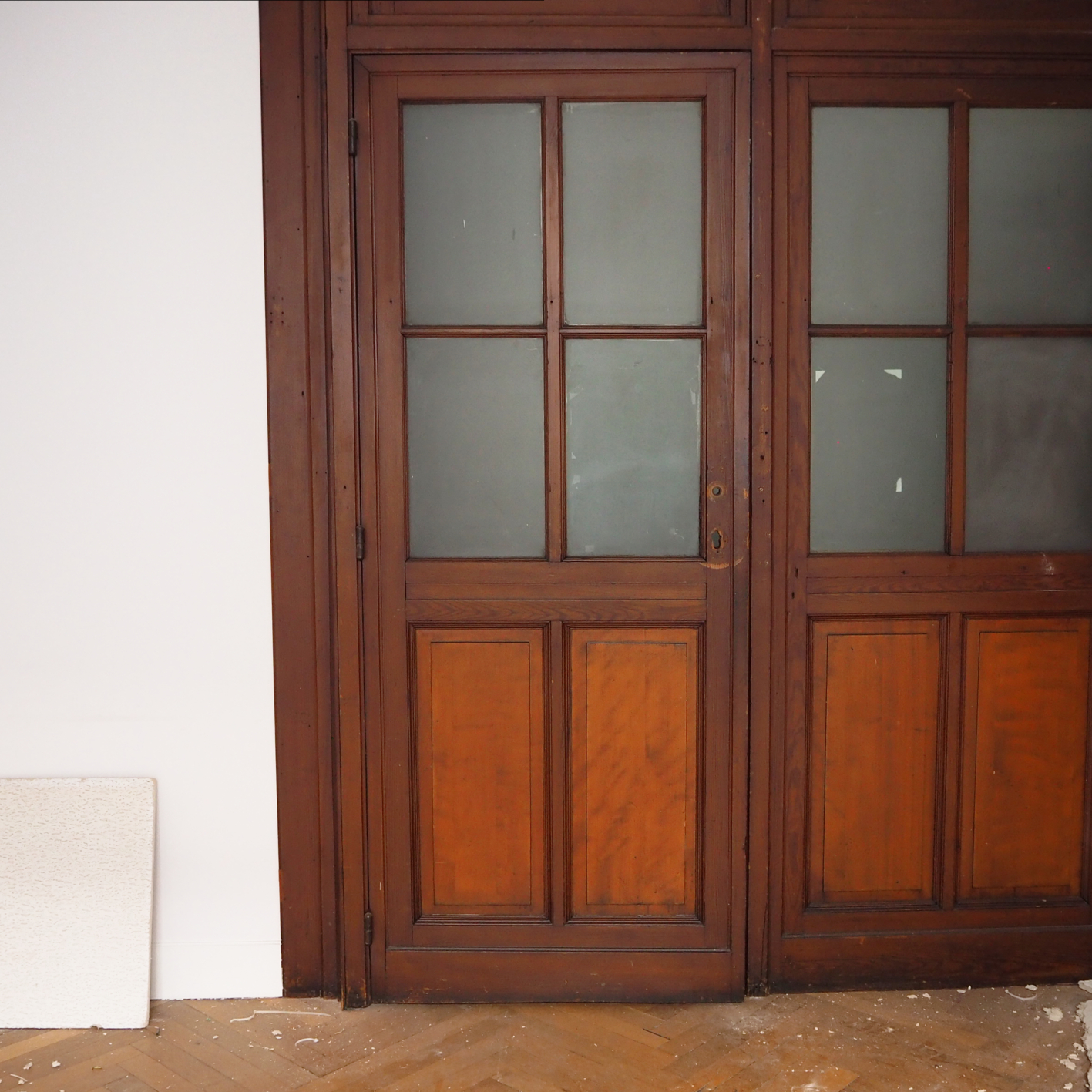 Solid wooden door with opaque glass panels