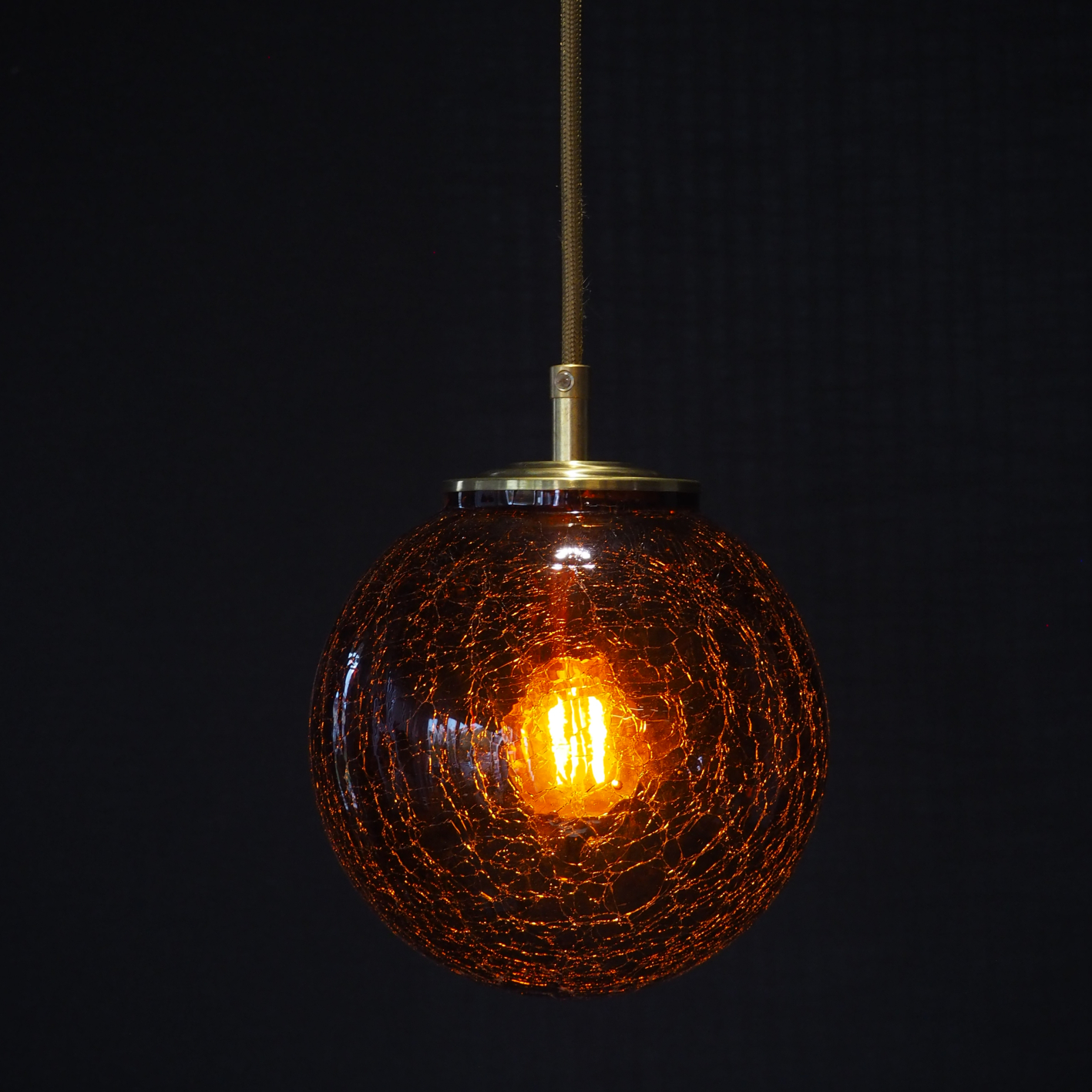 Hanging light with textured glass