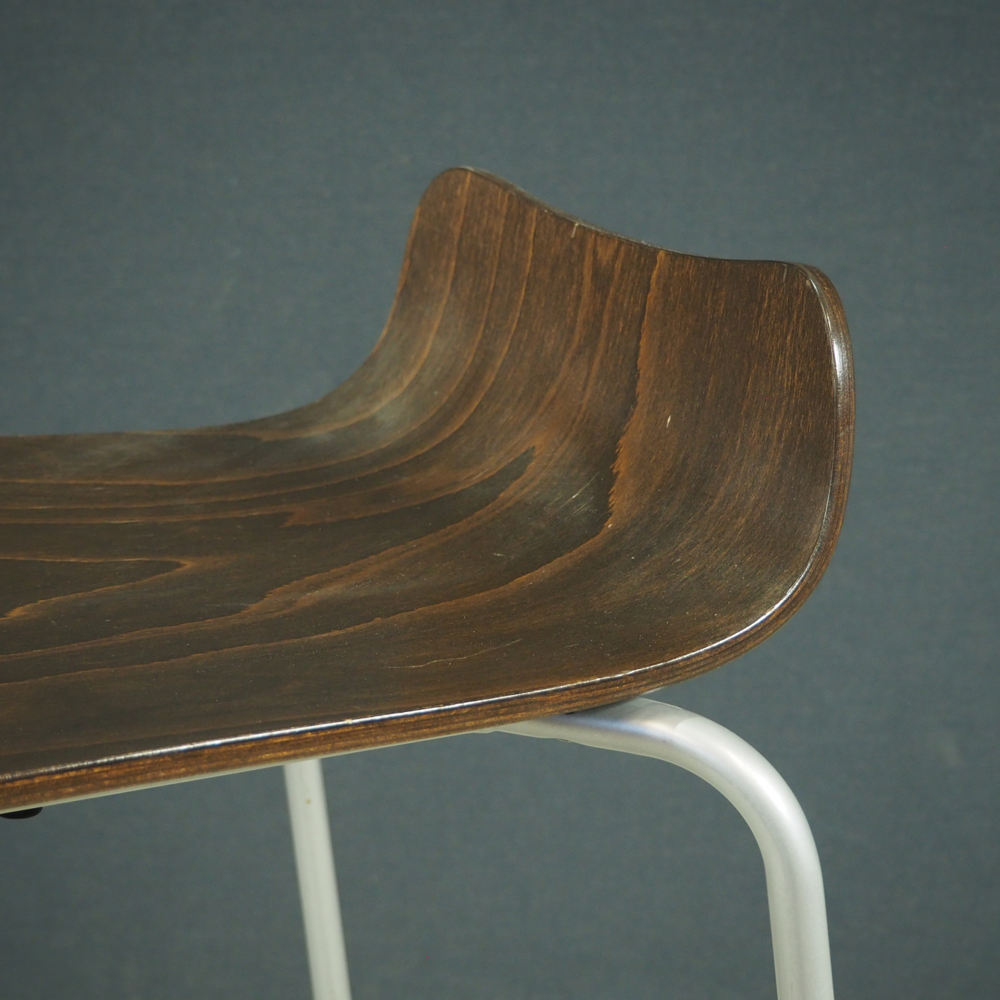 Bar stool with plywood seat and steel legs