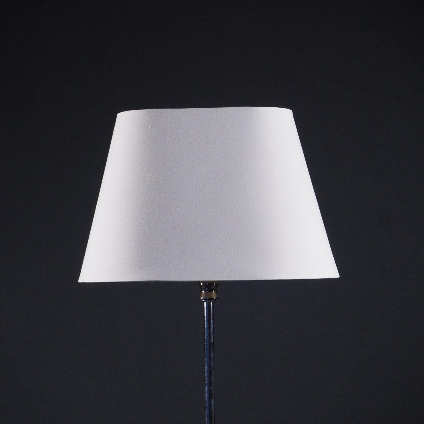 Table light with chromed-plated metal stand and textile lampshade
