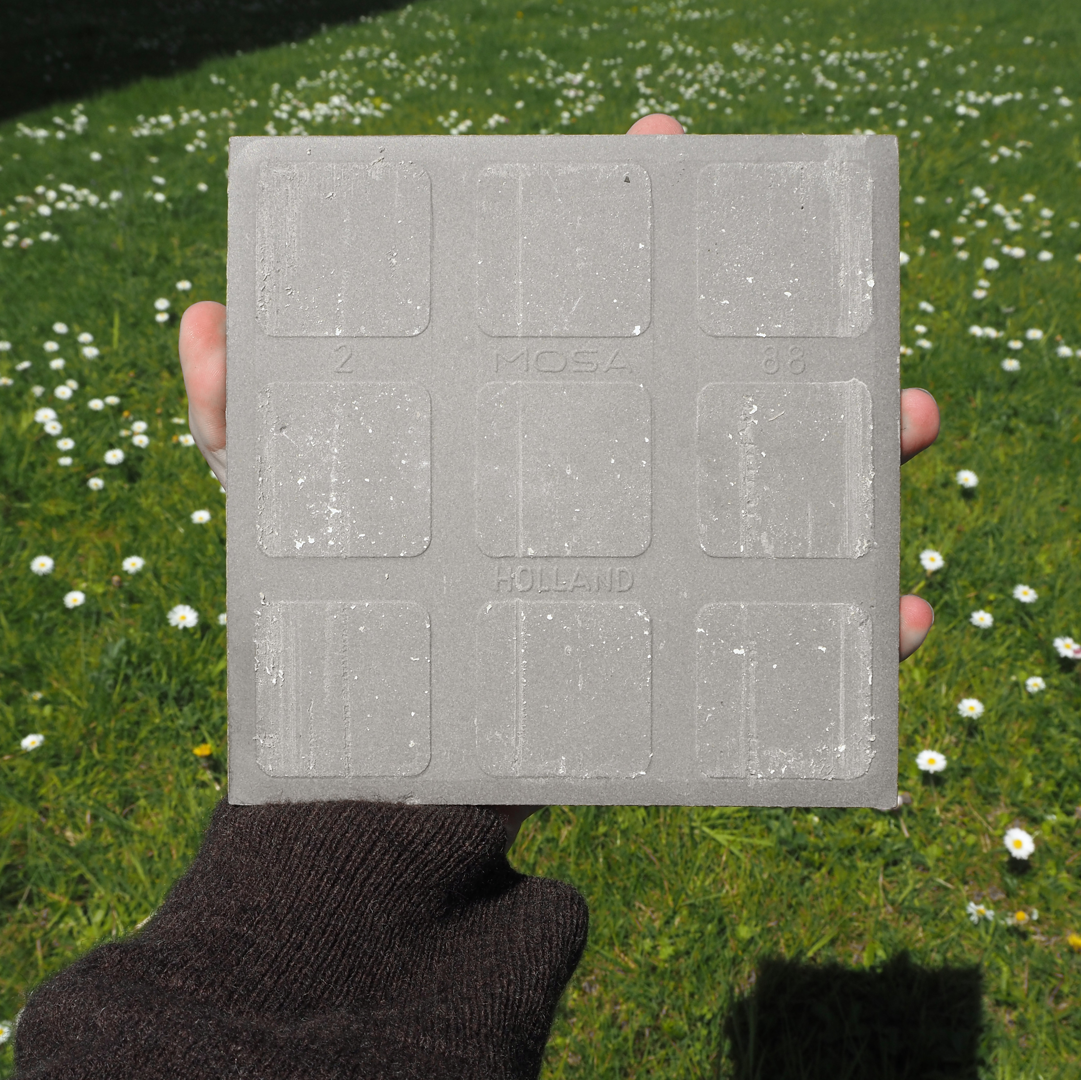 Grey ceramic tiles by Royal Mosa (150 x 150 mm)