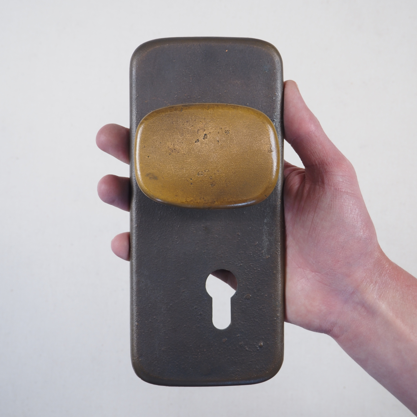 Door handle in solid bronze and stainless steel by Jules Wabbes (ca. 1970)