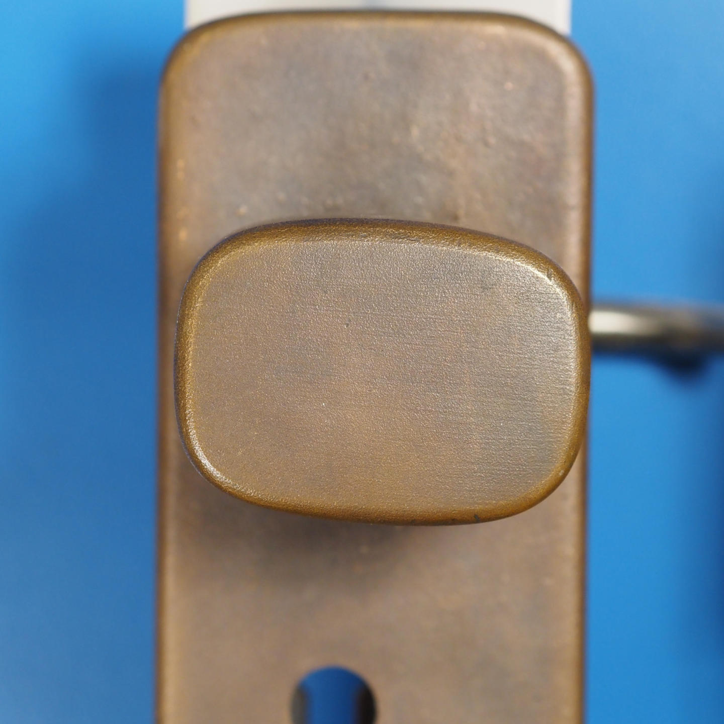 Door handle in solid bronze and stainless steel by Jules Wabbes (ca. 1970)