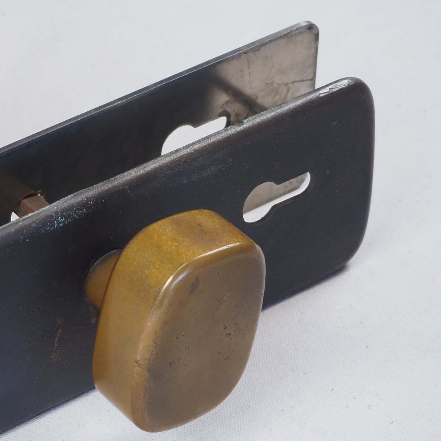 Door handle in solid bronze and stainless steel by Jules Wabbes (ca. 1970)