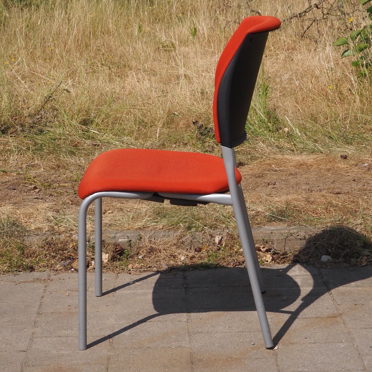 Chair by Drabert in orange fabric and steel frame