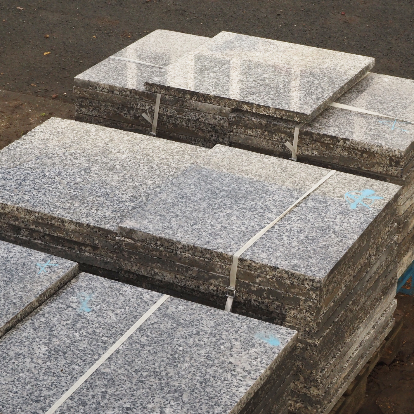 Light grey granite tiles (60 x 60 cm)