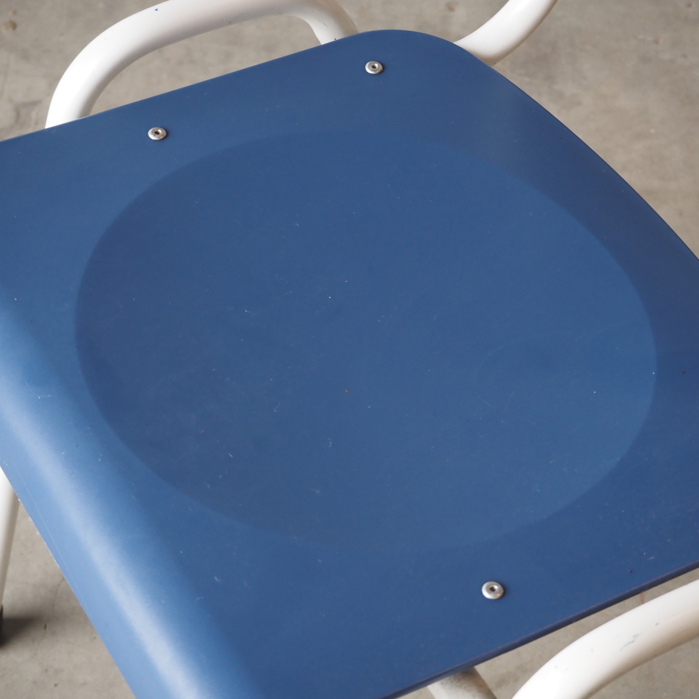 Stackable chair in steel with polypropylene seat and backrest