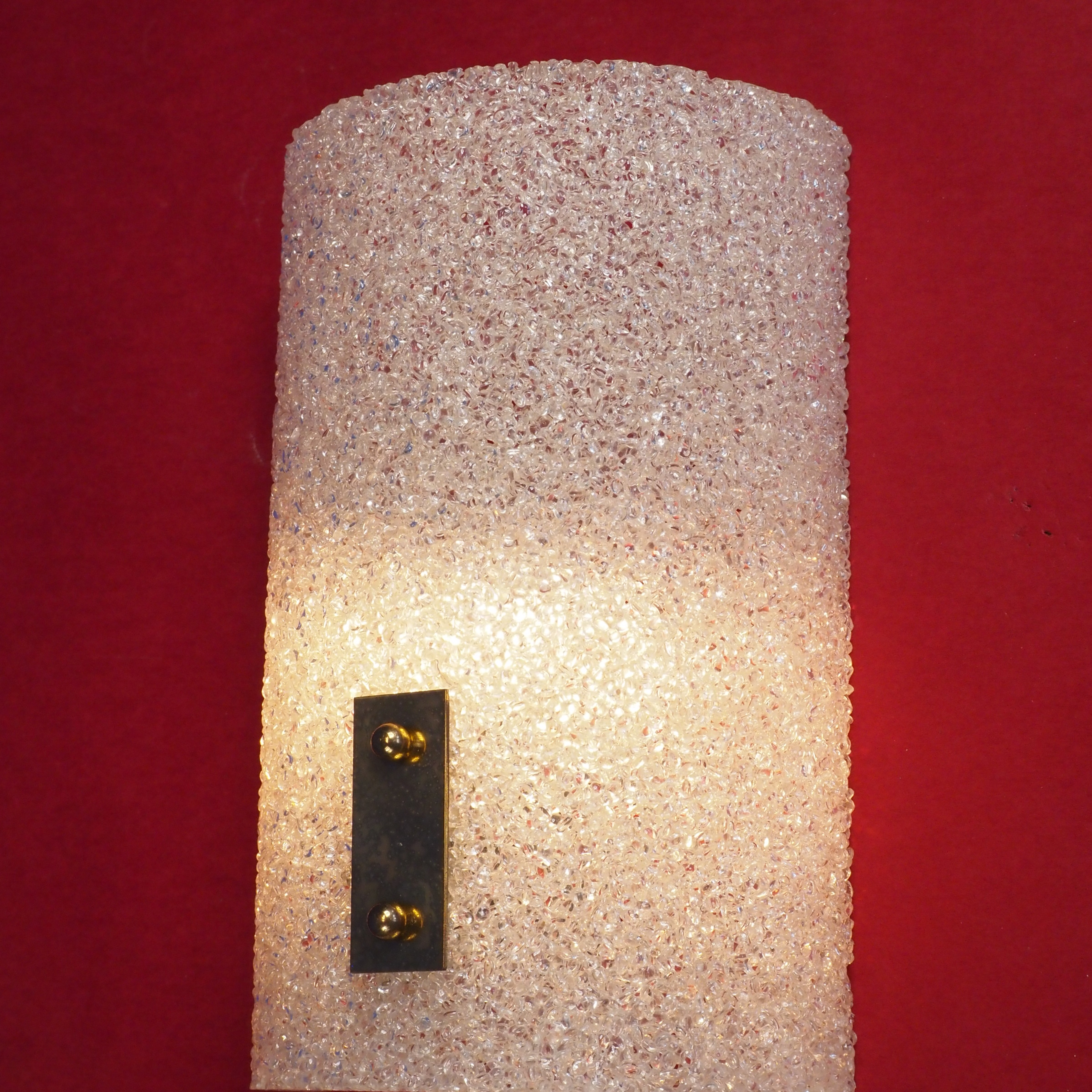 Wall light with textured plastic diffuser