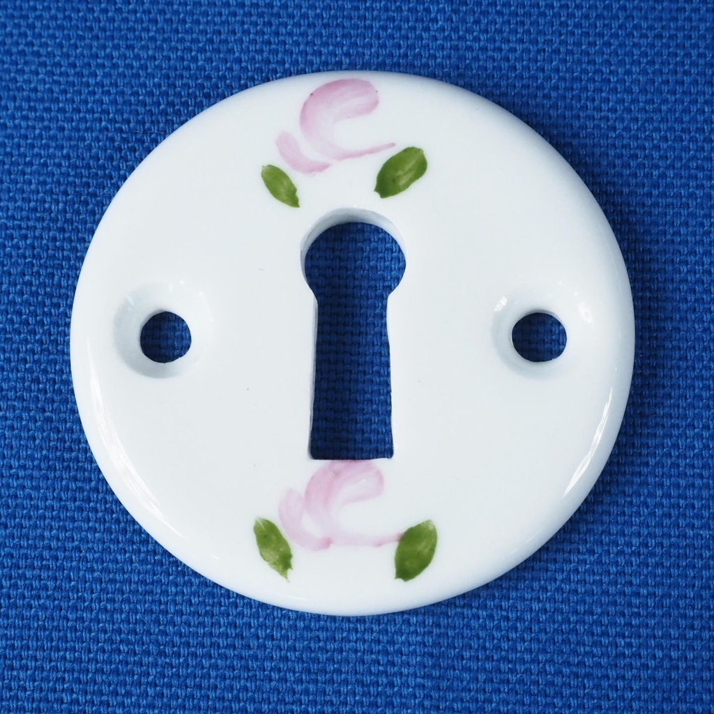 Door handle in brass and porcelain with key rosettes by Linea Bertomani