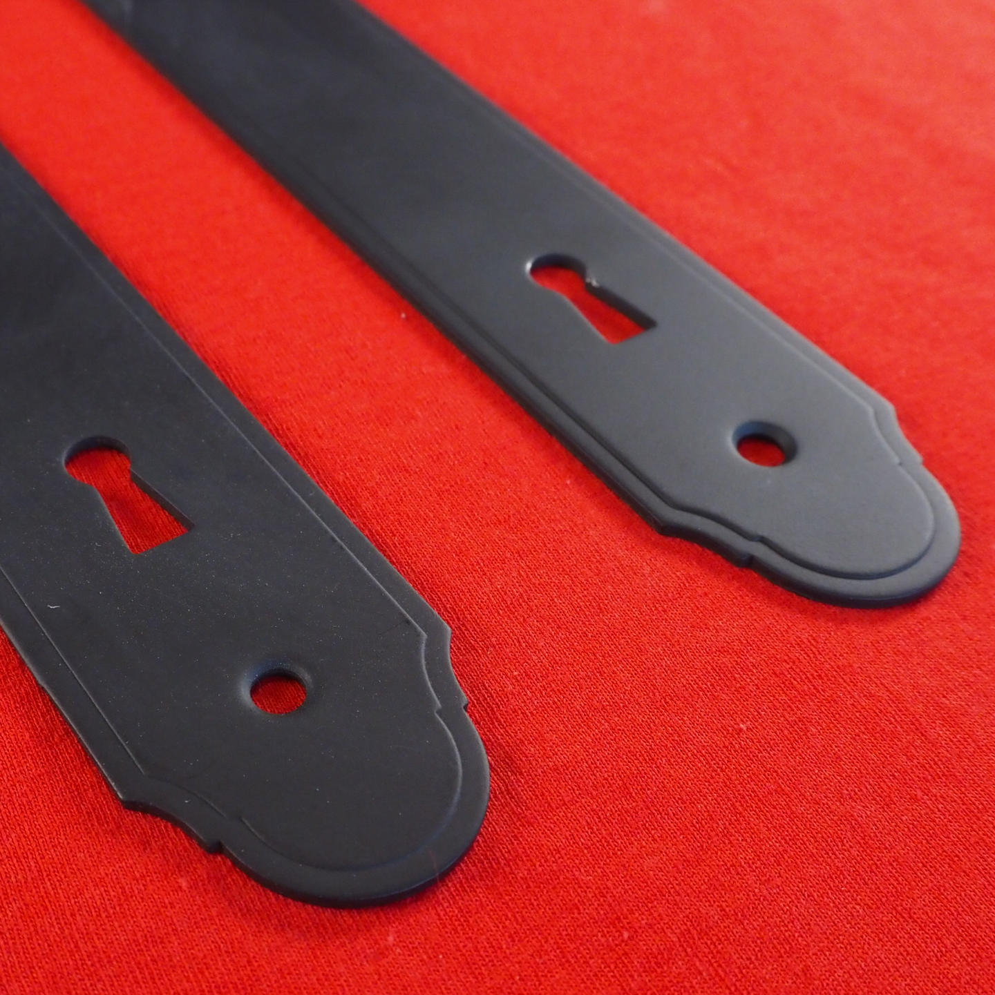 Pair of doorplates in black powder coated steel.