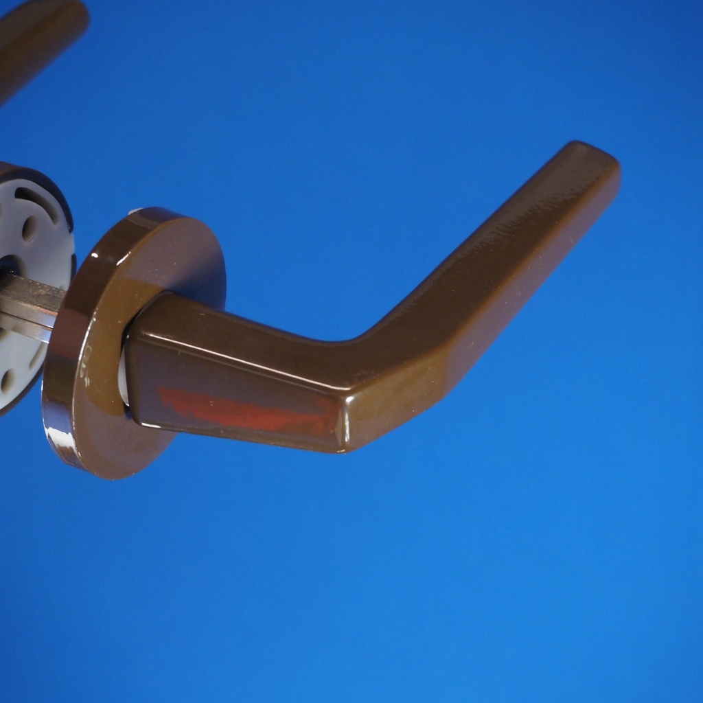 Door handle in brown coated stainless steel with key rosettes