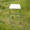 Side table on castors with rods by Röder Sohne, Germany (ca. 1980)
