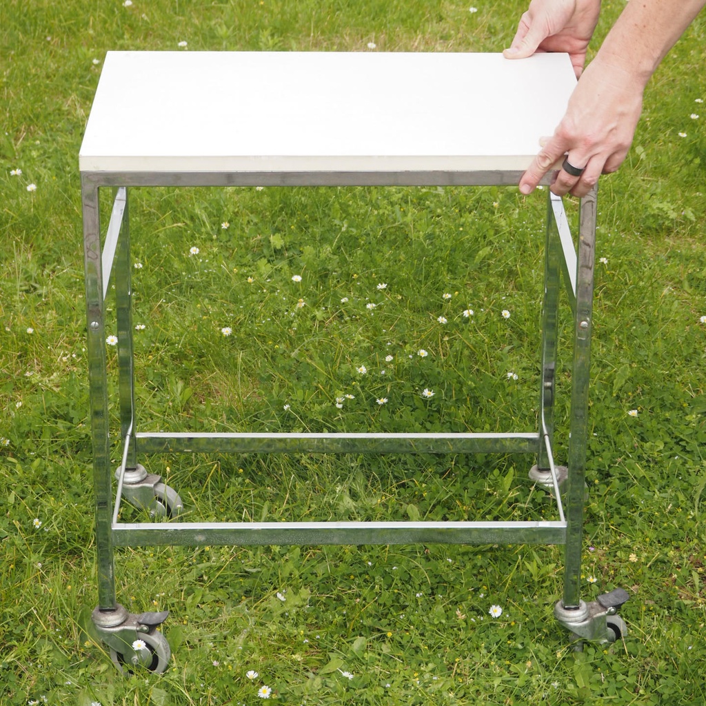 Side table on castors with rods by Röder Sohne, Germany (ca. 1980)