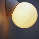 Wall light 'Bo-Niko' in opaline glass and bakelite by Niko (ca. 1960)