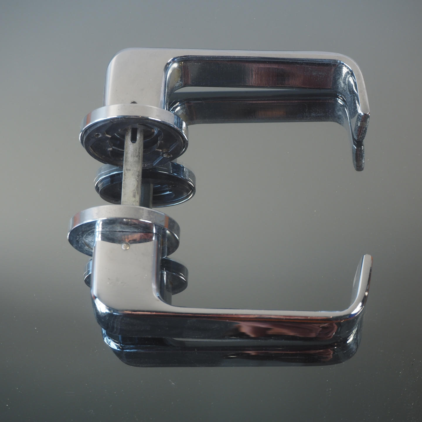 Door handle in chromed brass by Maison Vervloet (ca. 1973)