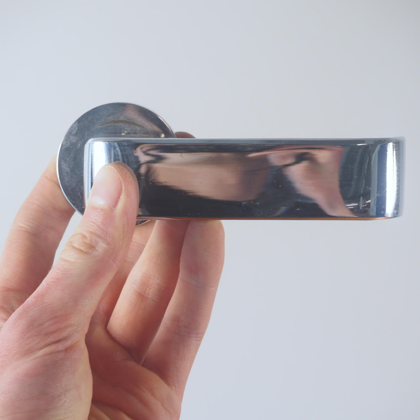 Door handle in chromed brass by Maison Vervloet (ca. 1973)
