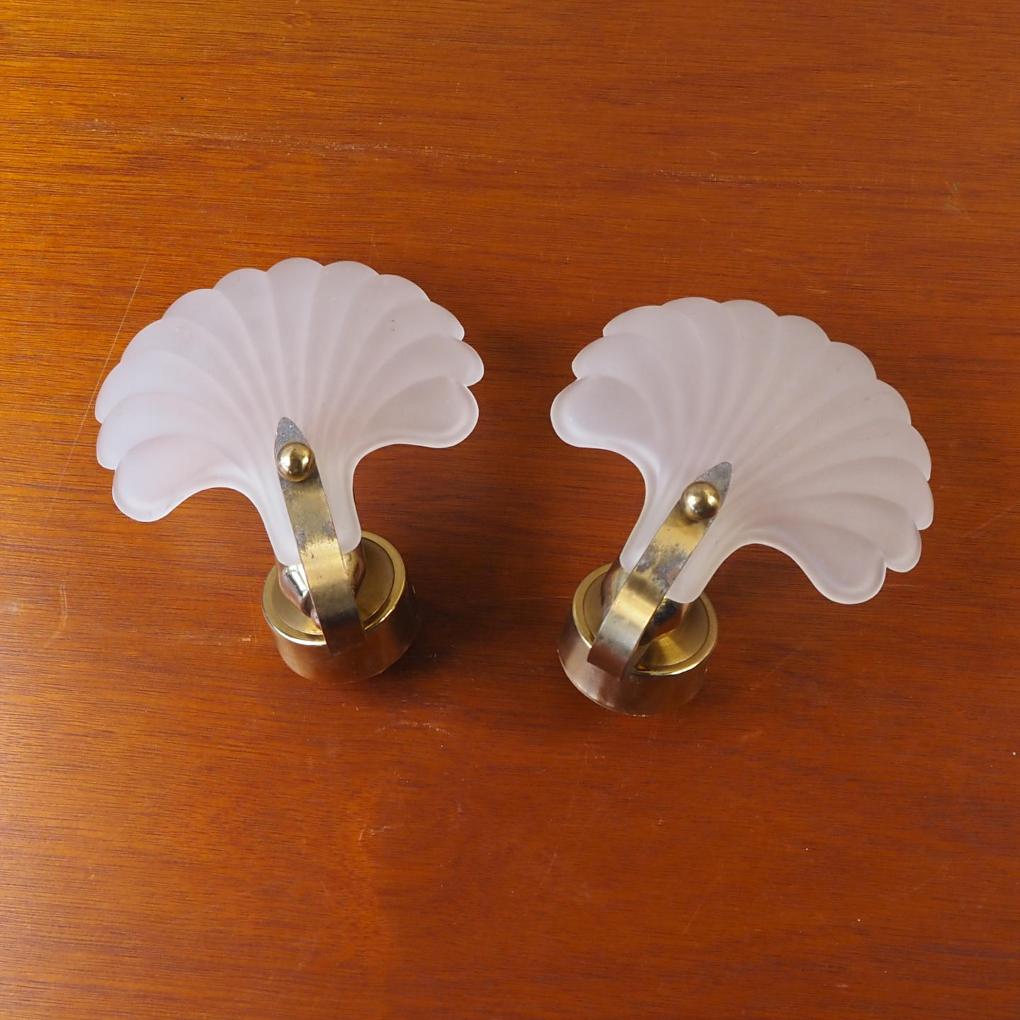 Pair of wall lights in brass and frosted glass by Deknudt Lighting (ca. 1970)