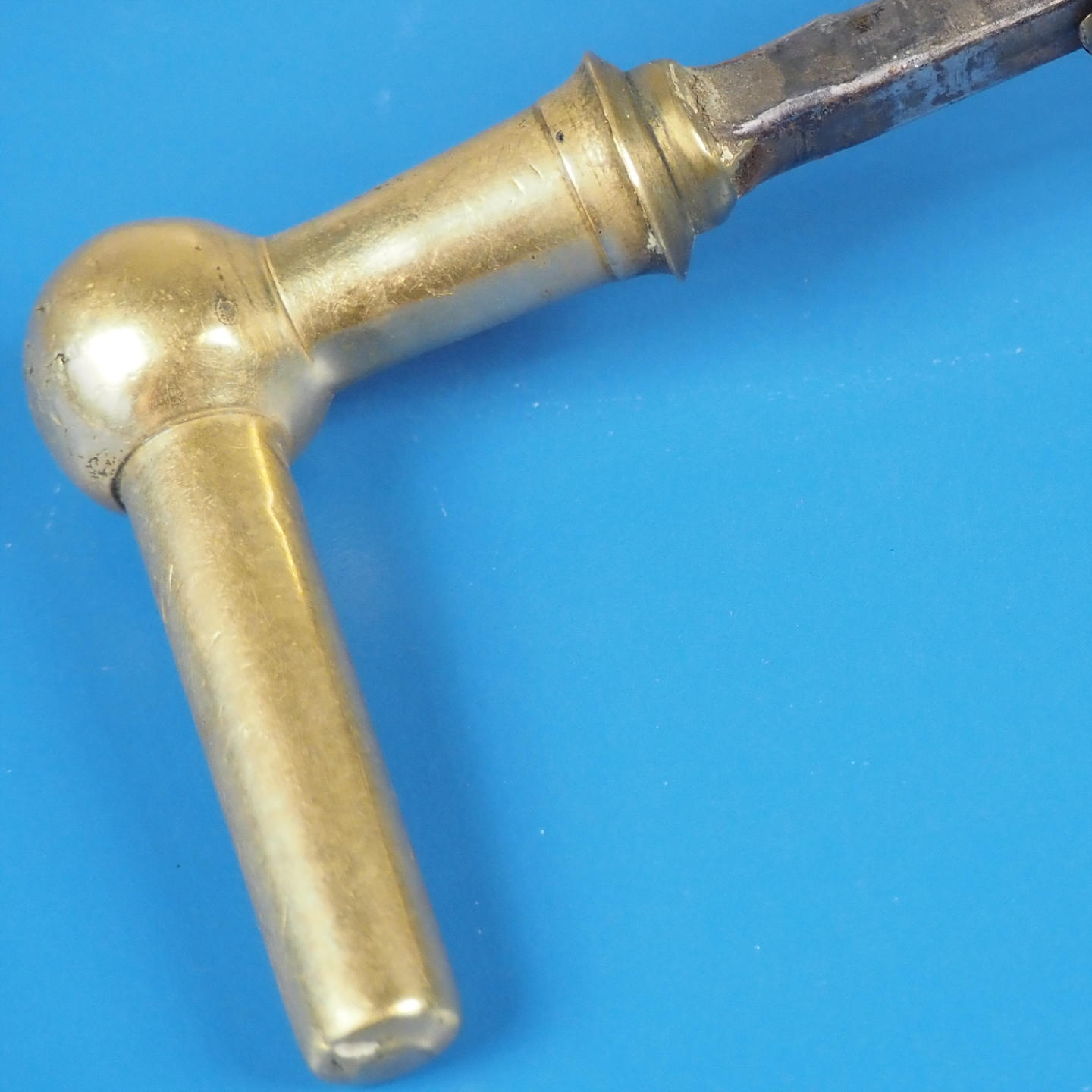 Door handle in solid brass