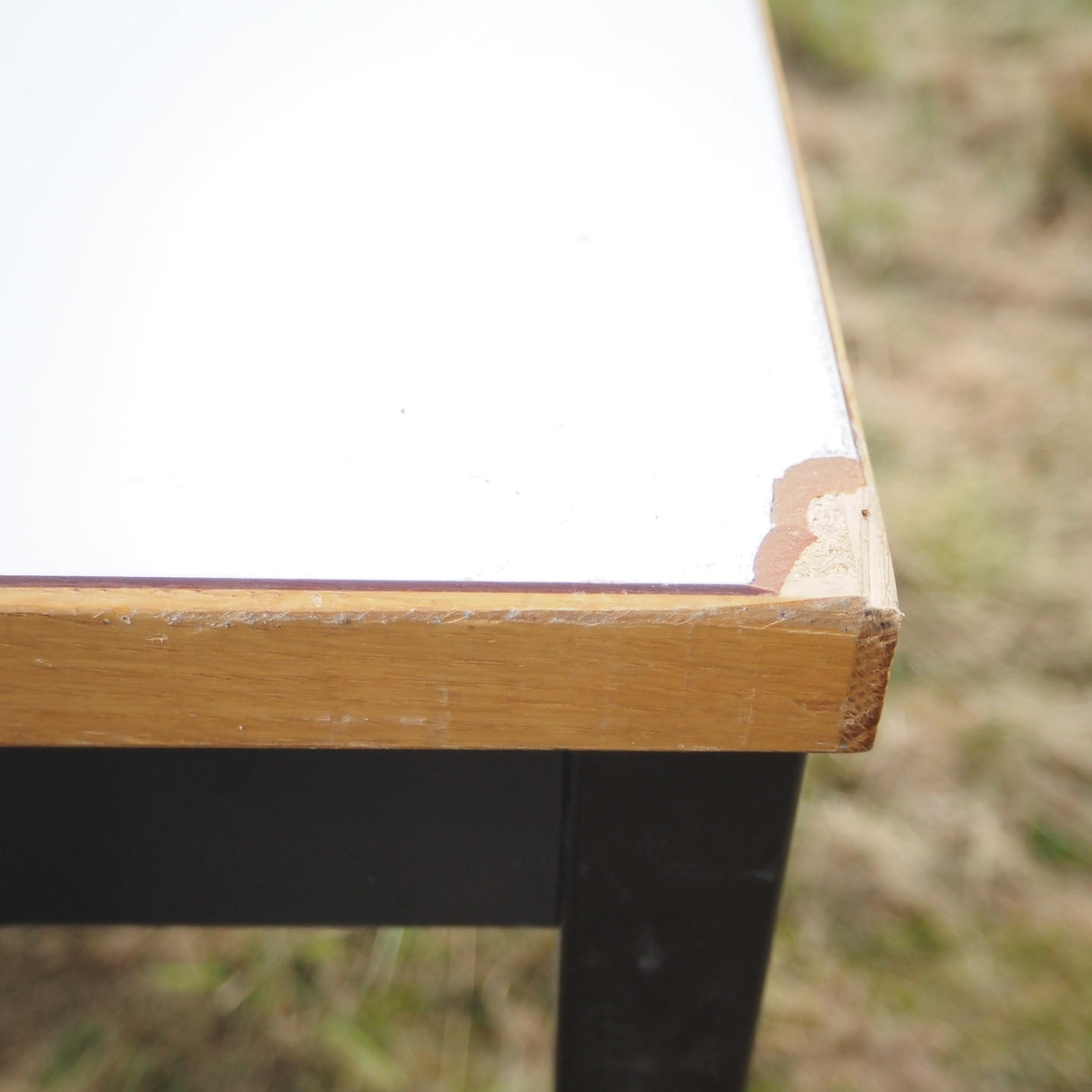 Table with off-white laminated tabletop and steel base from KU Leuven (140 x 70 cm)