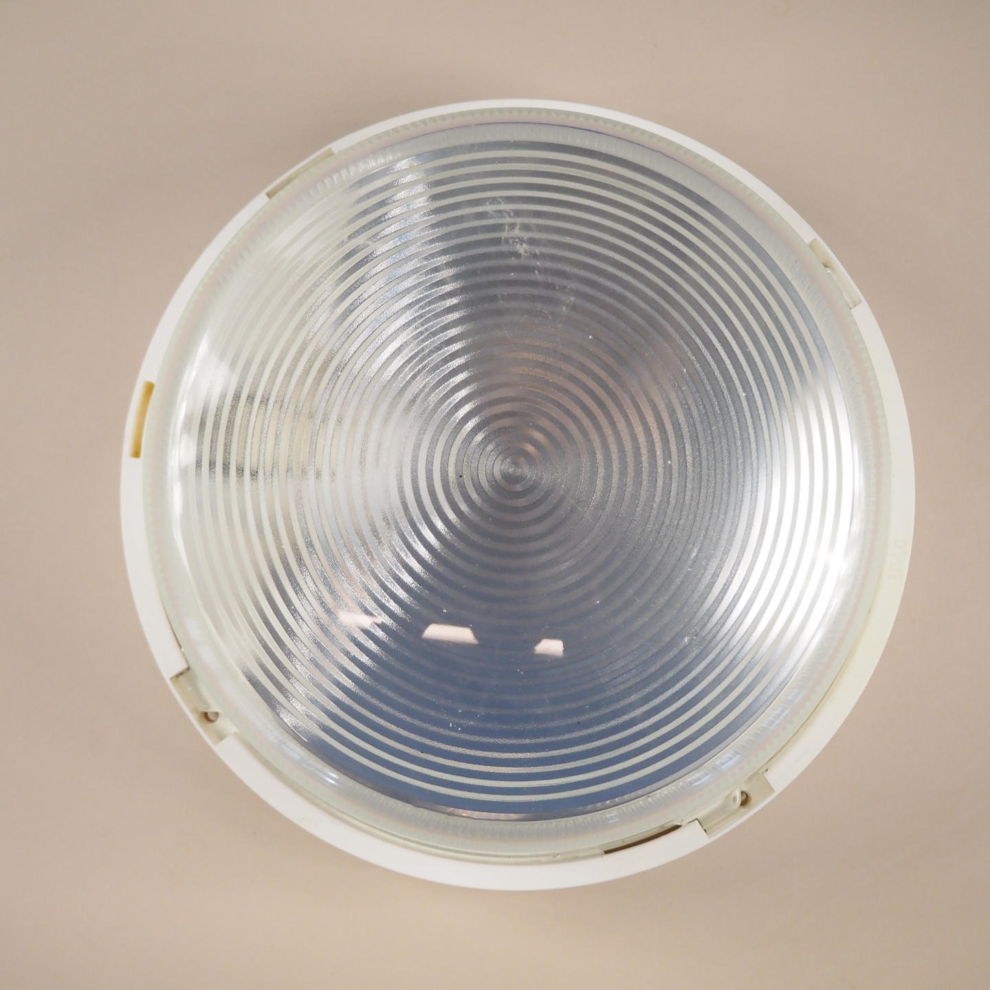 Wall light with textured glass diffuser by Legrand (IP44)