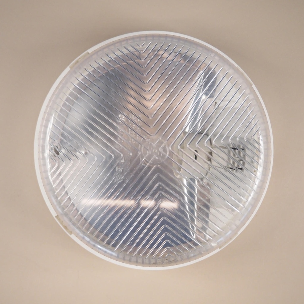 Wall light with textured plastic diffuser by Legrand (IP44)