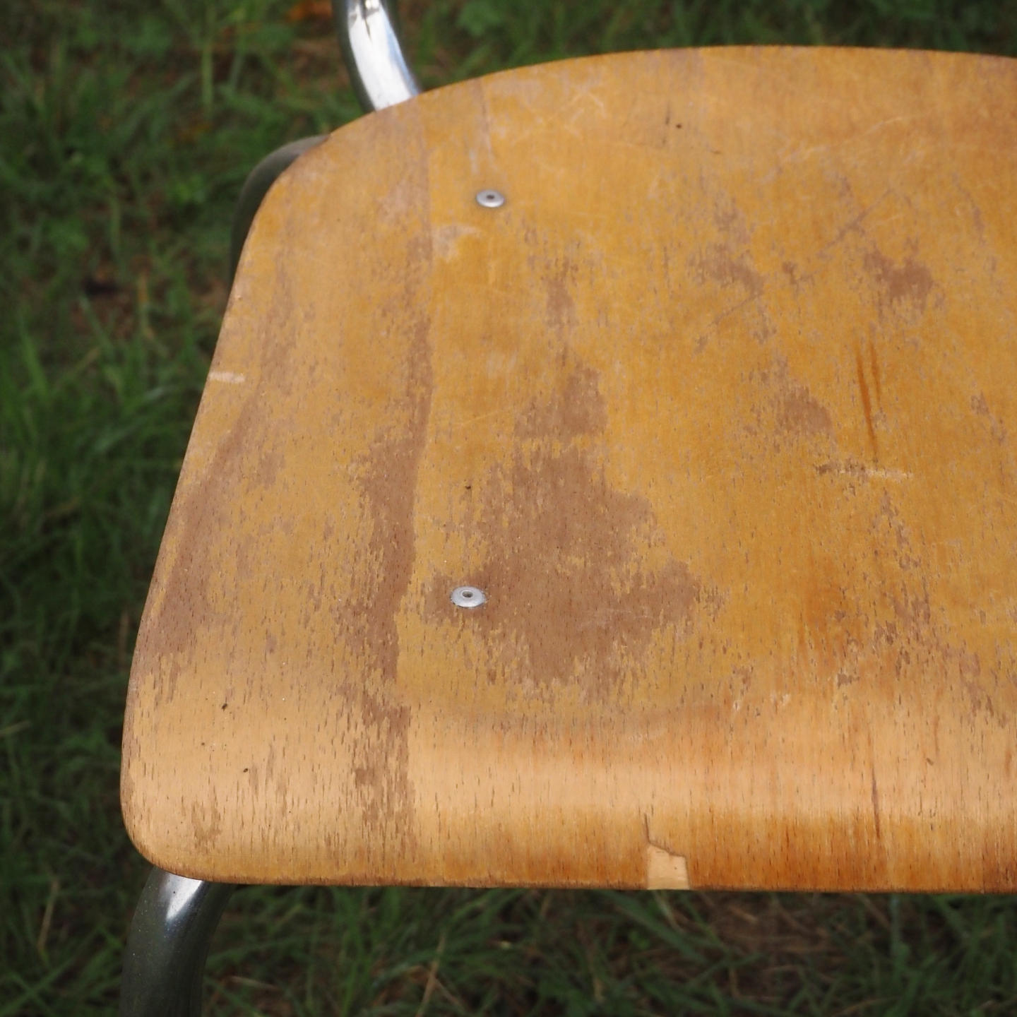 Stackable school chair with chromed steel legs