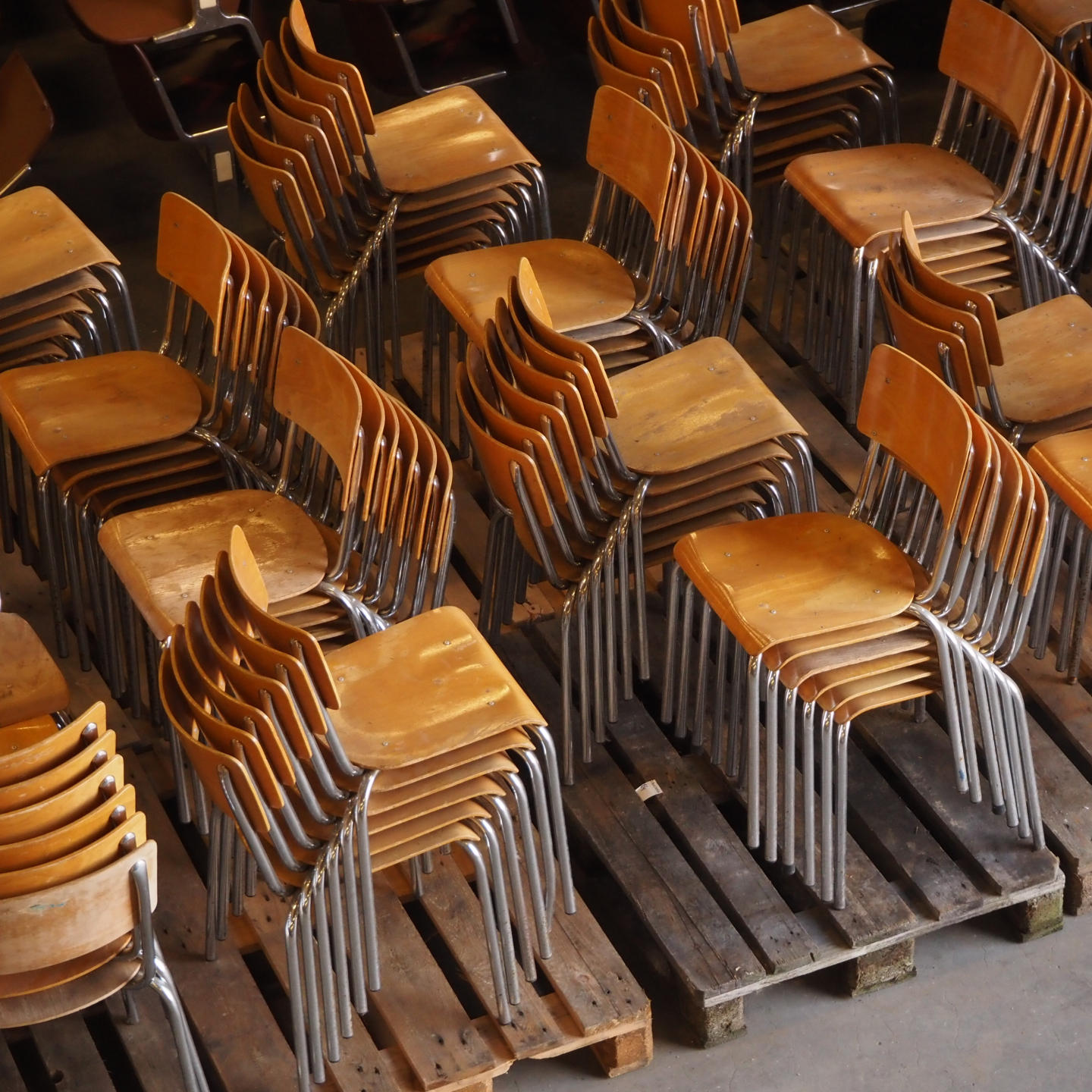 Stackable school chair with chromed steel legs