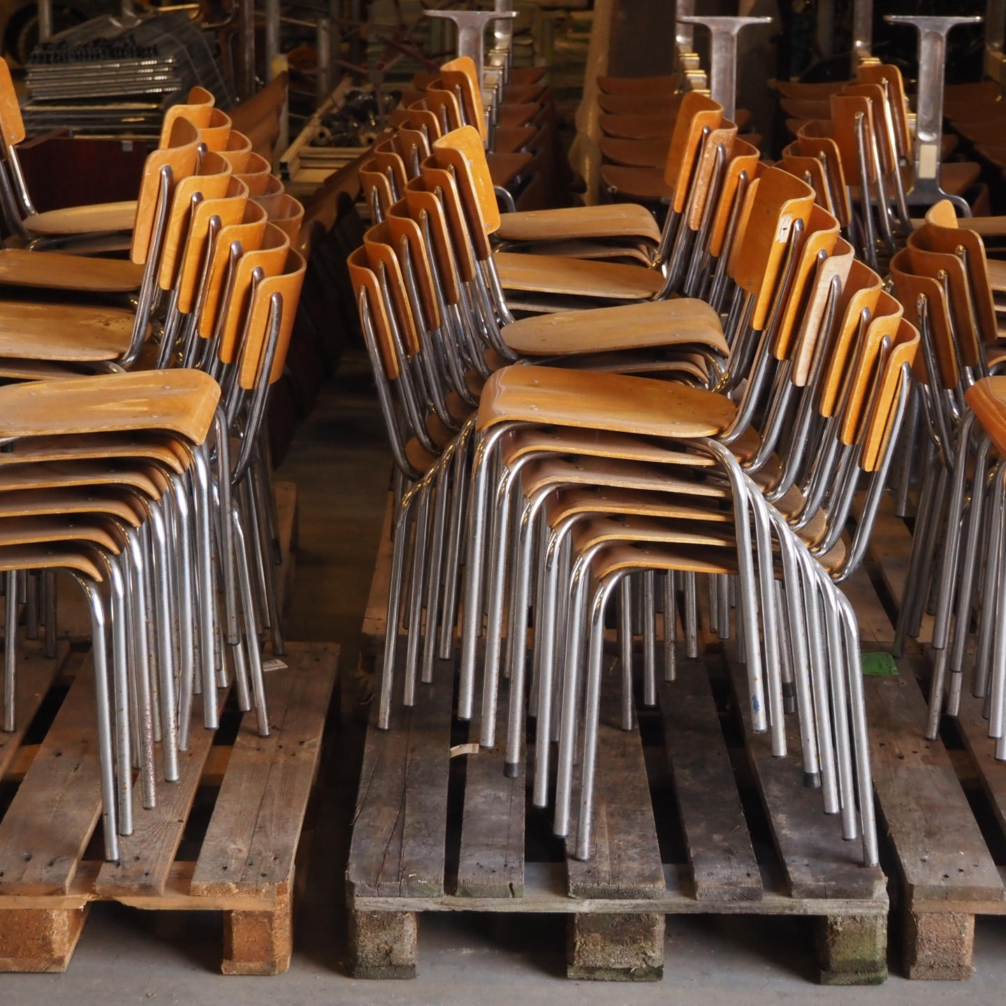 Stackable school chair with chromed steel legs