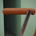 Stackable chair in brown synthetic leather from Antwerp's Court of Appeal