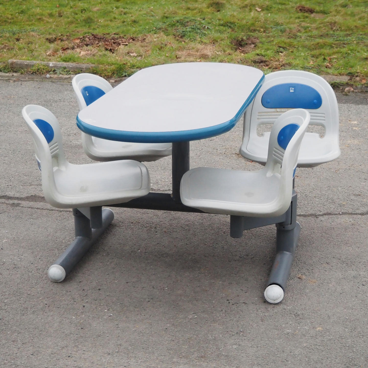 Bowling table with rotating plastic bucket seats by Brunswick