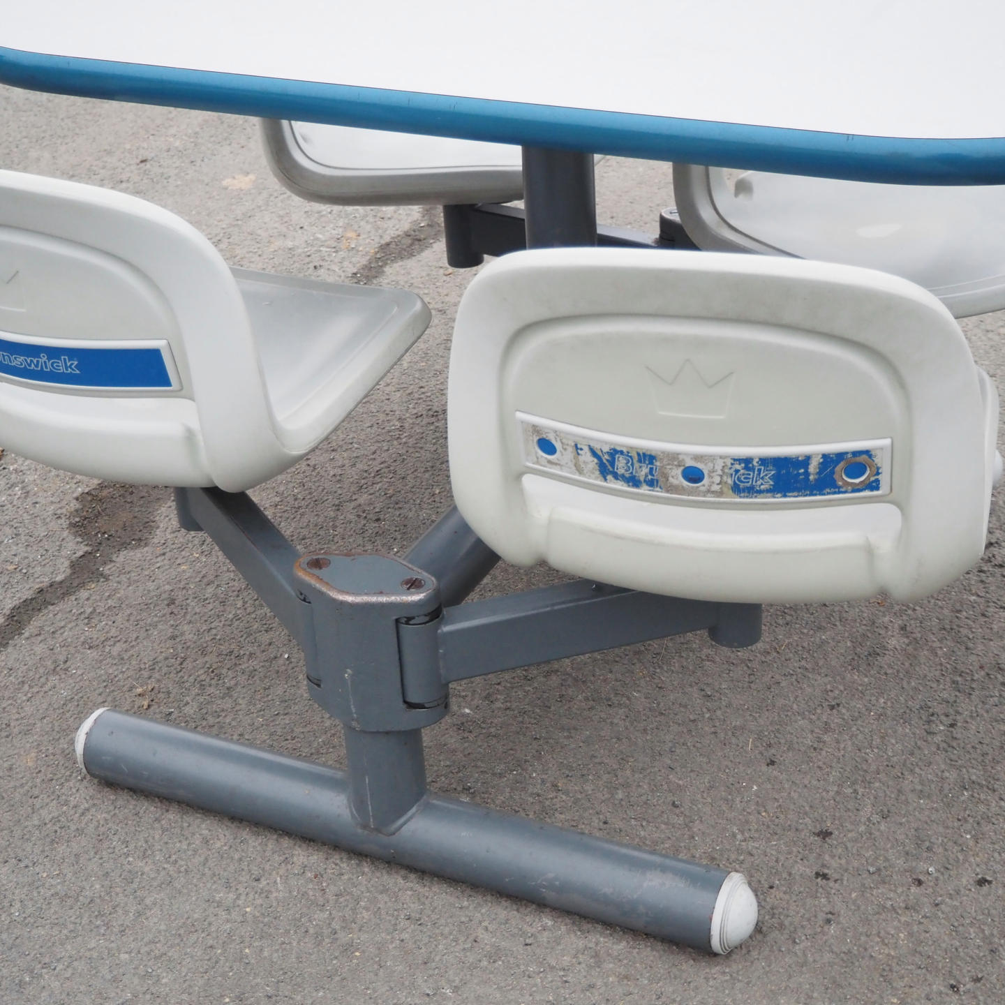 Bowling table with rotating plastic bucket seats by Brunswick