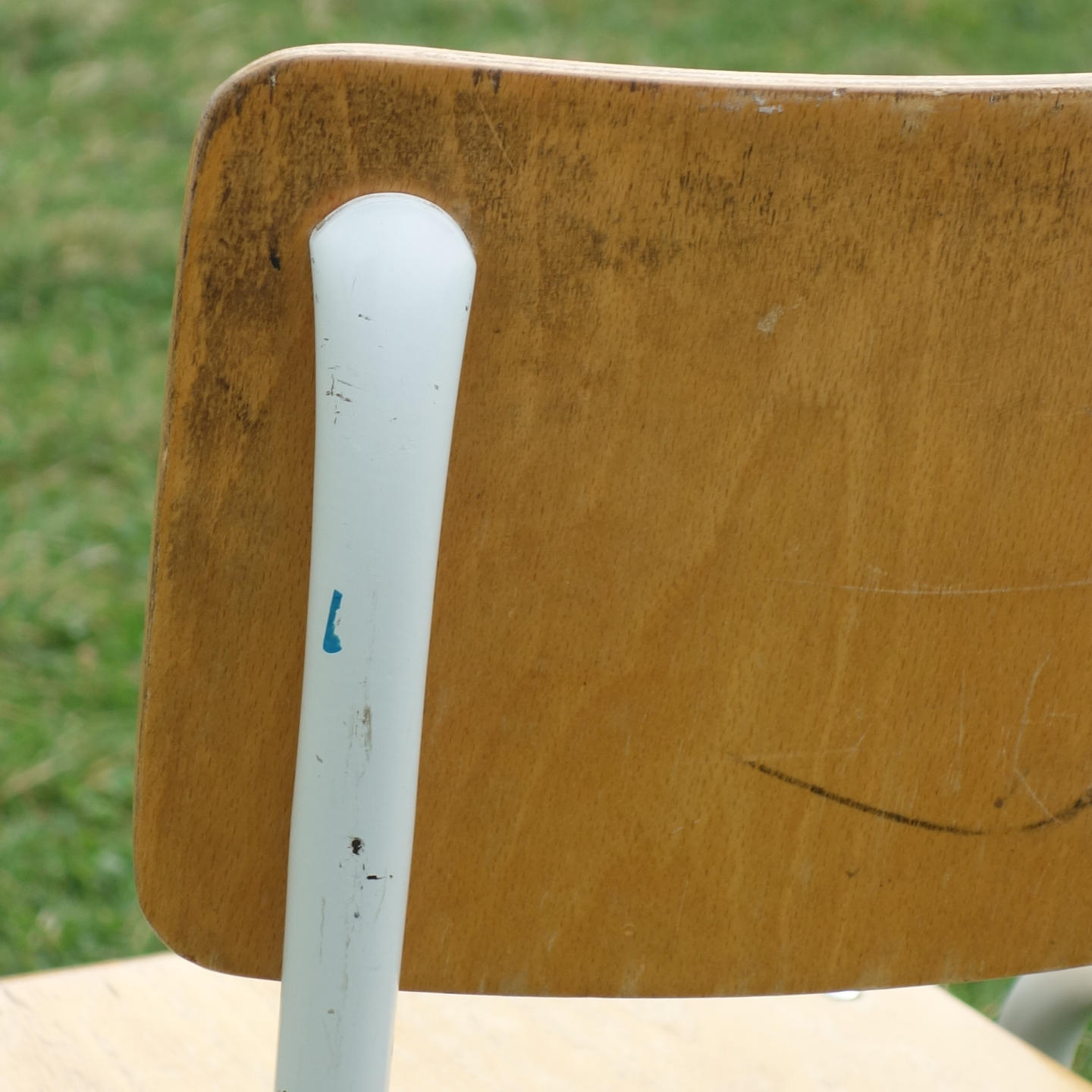 Stackable school chair with chromed tubular steel legs