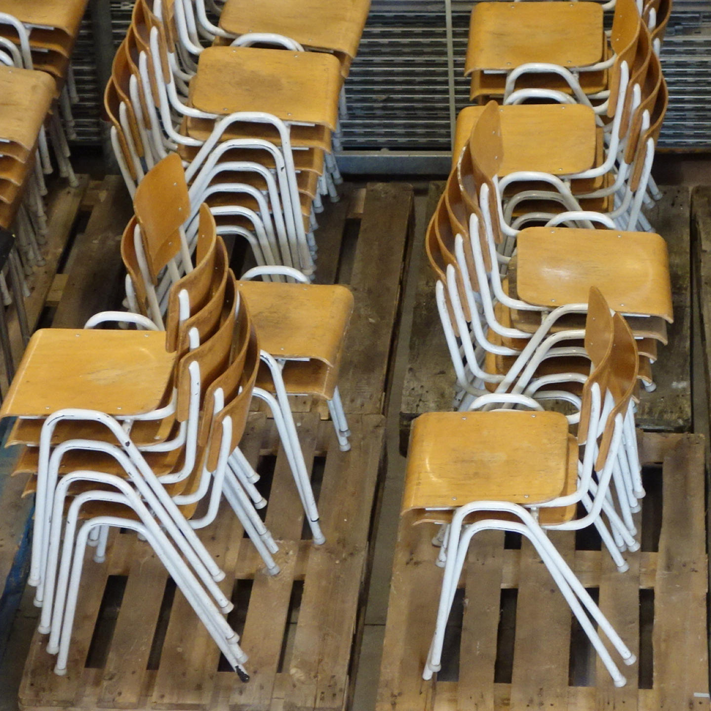 Stackable school chair with chromed tubular steel legs
