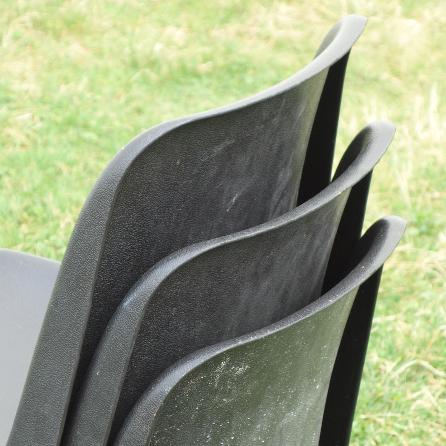 Stackable chair with black polypropylene shell