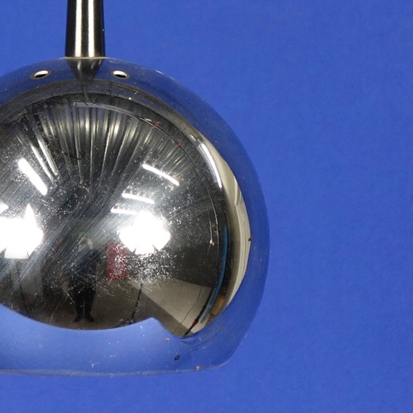Hanging light in chromed steel
