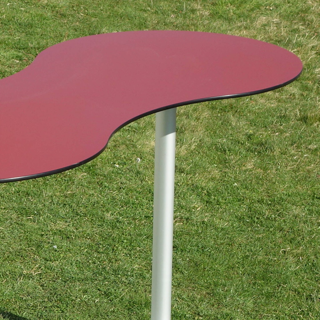 Table with orange laminated tabletop and powder coated steel legs by bene