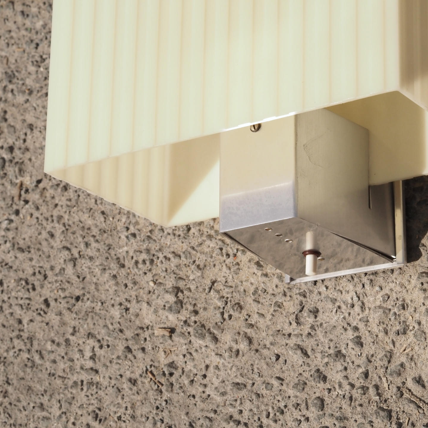 Wall light by Erco with aluminium base and switch (ca. 1960)