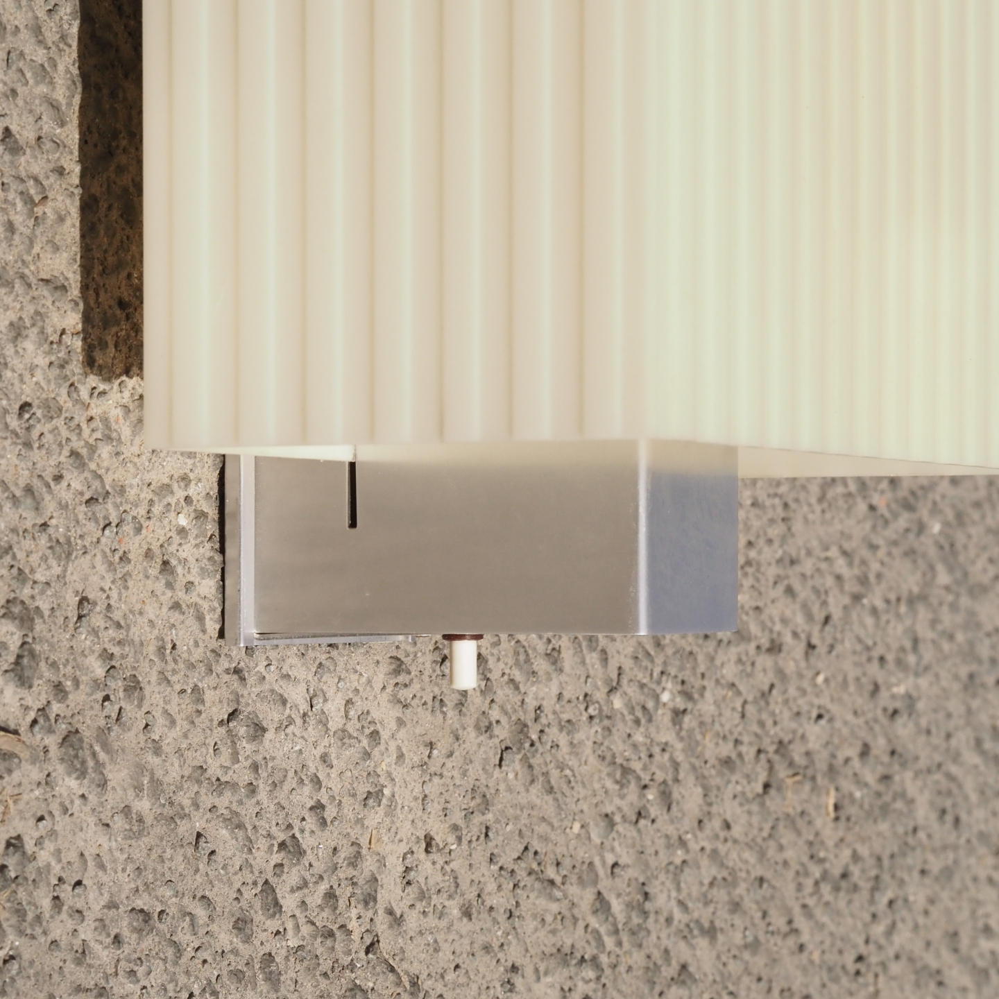 Wall light by Erco with aluminium base and switch (ca. 1960)