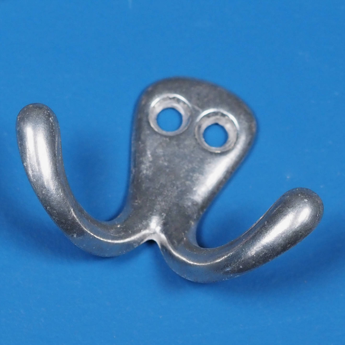 Coat hook in cast aluminium
