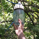 Outdoor industrial lantern with porcelain base and ribbed glass
