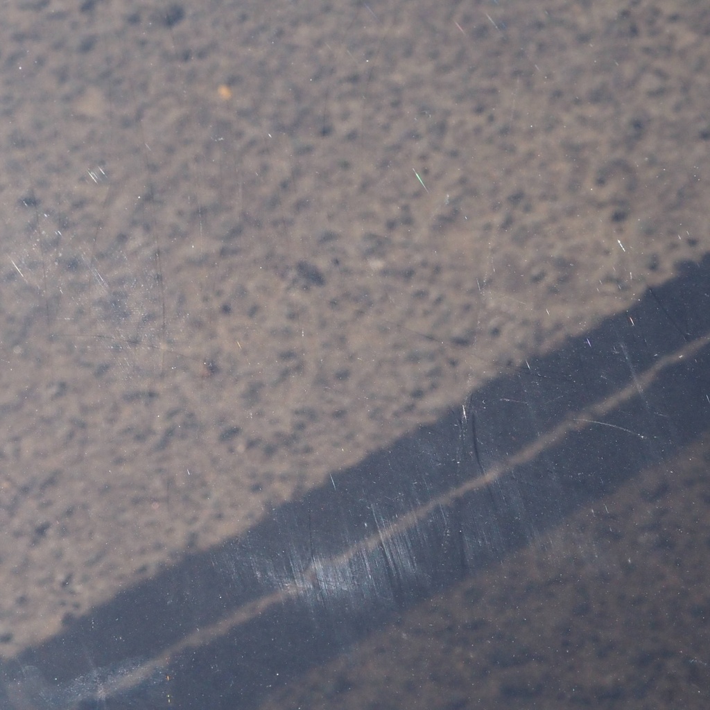 Coffee table with smoked tempered glass top and tubular chromed steel base