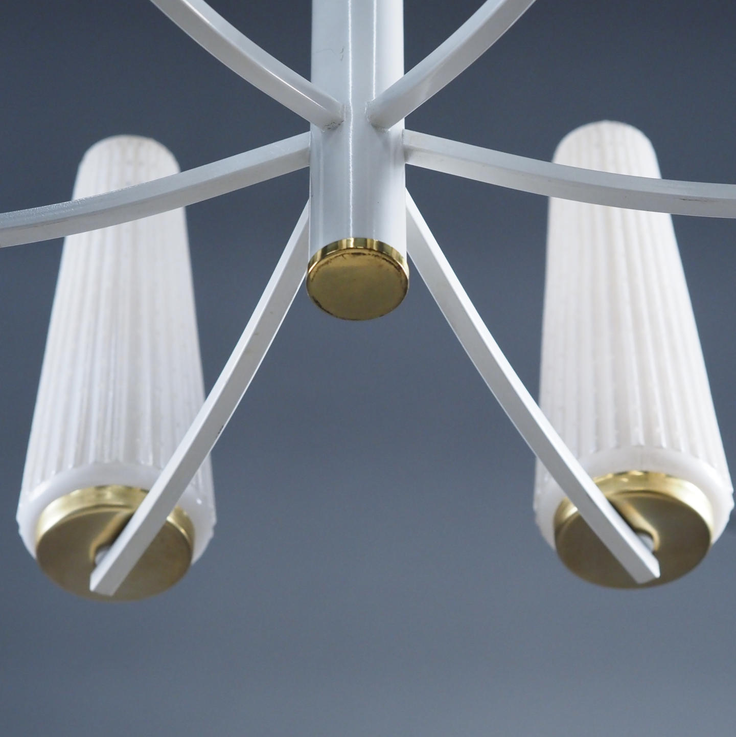 Chandelier in brass with textured glass shades