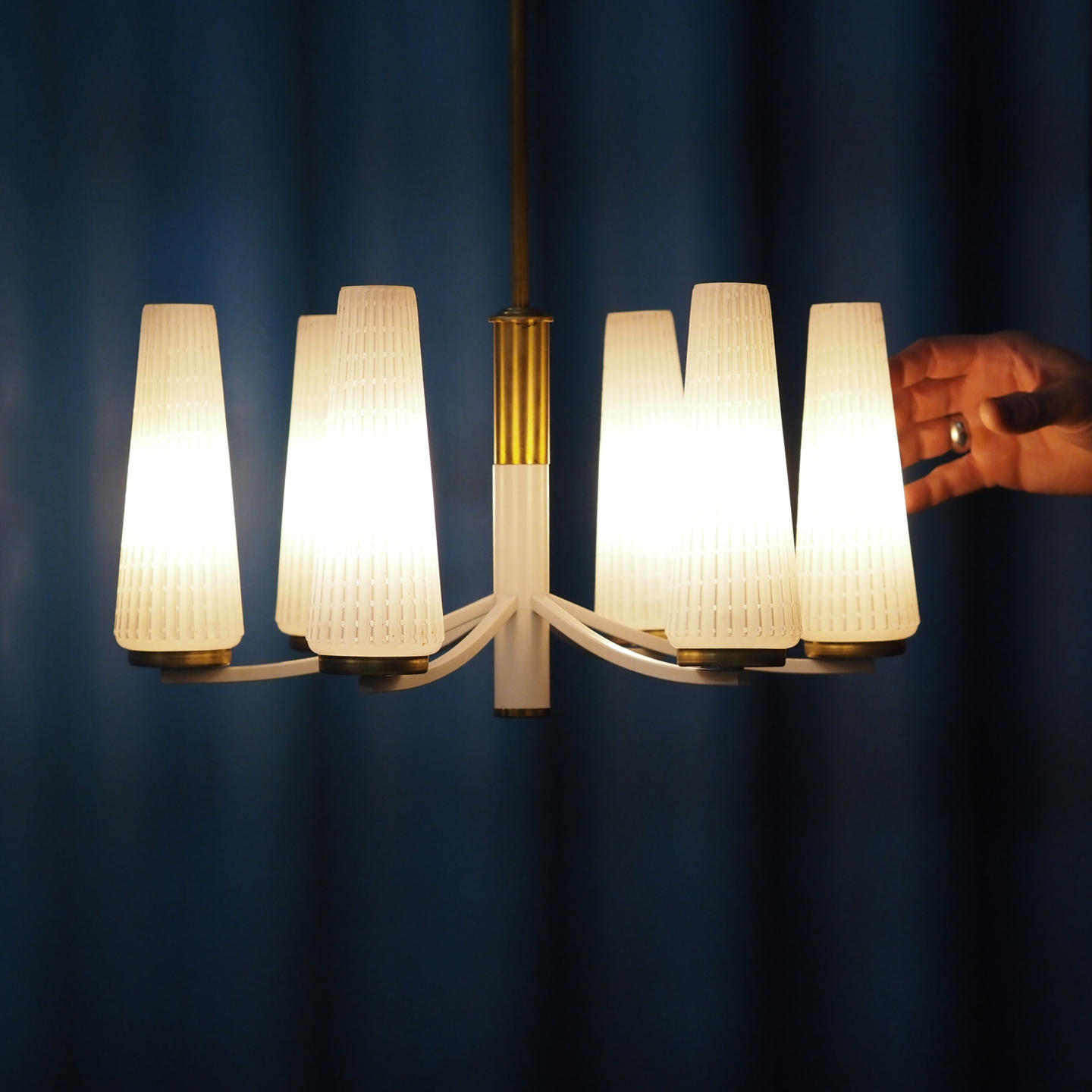 Chandelier in brass with textured glass shades