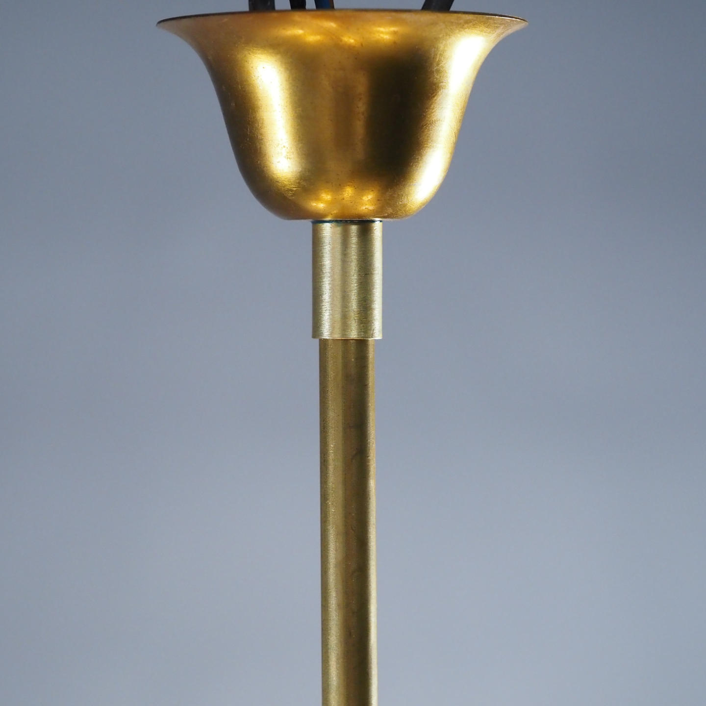 Chandelier in brass with textured glass shades