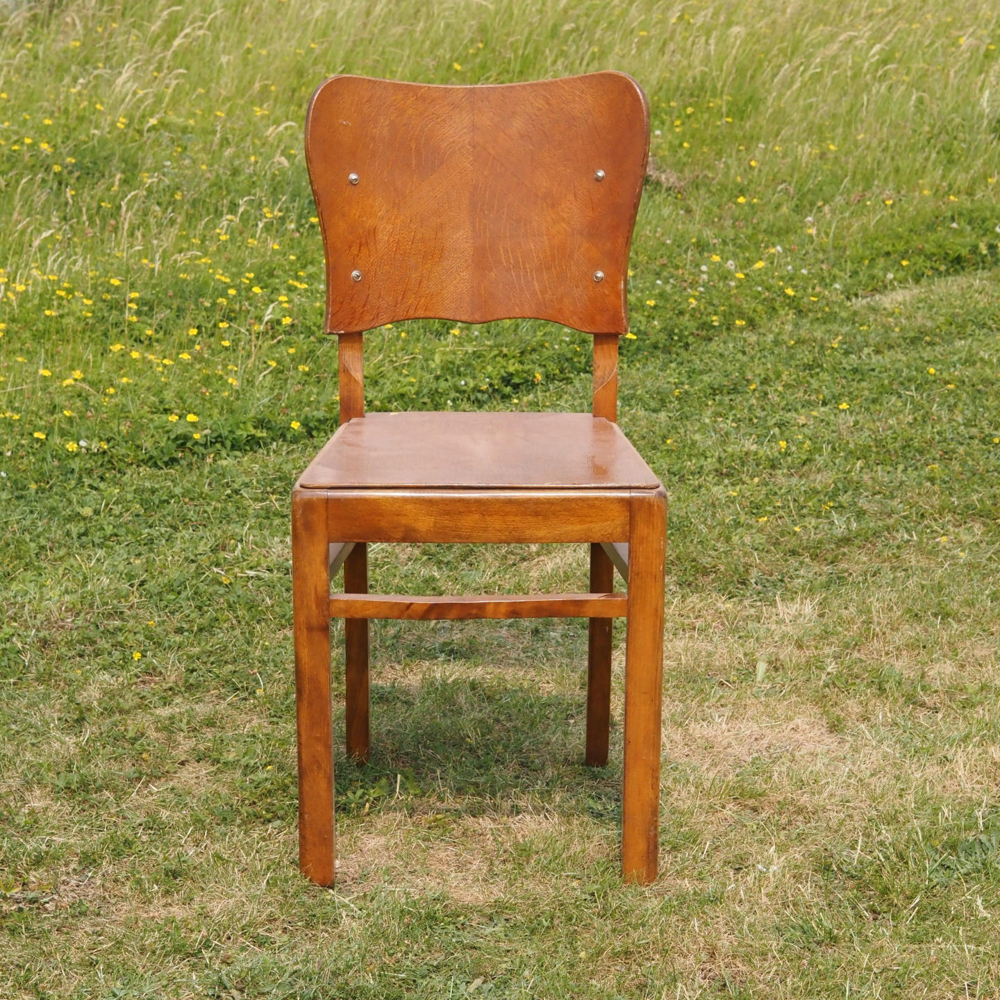 Chair in varnished oak (ca. 1960)