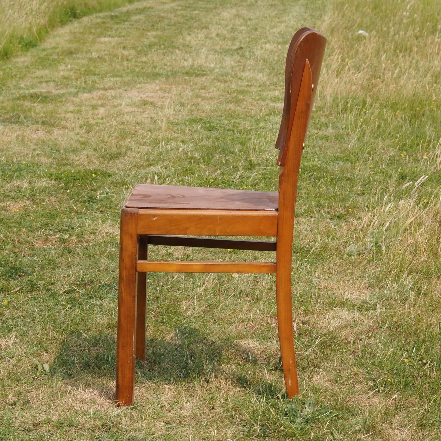 Chair in varnished oak (ca. 1960)