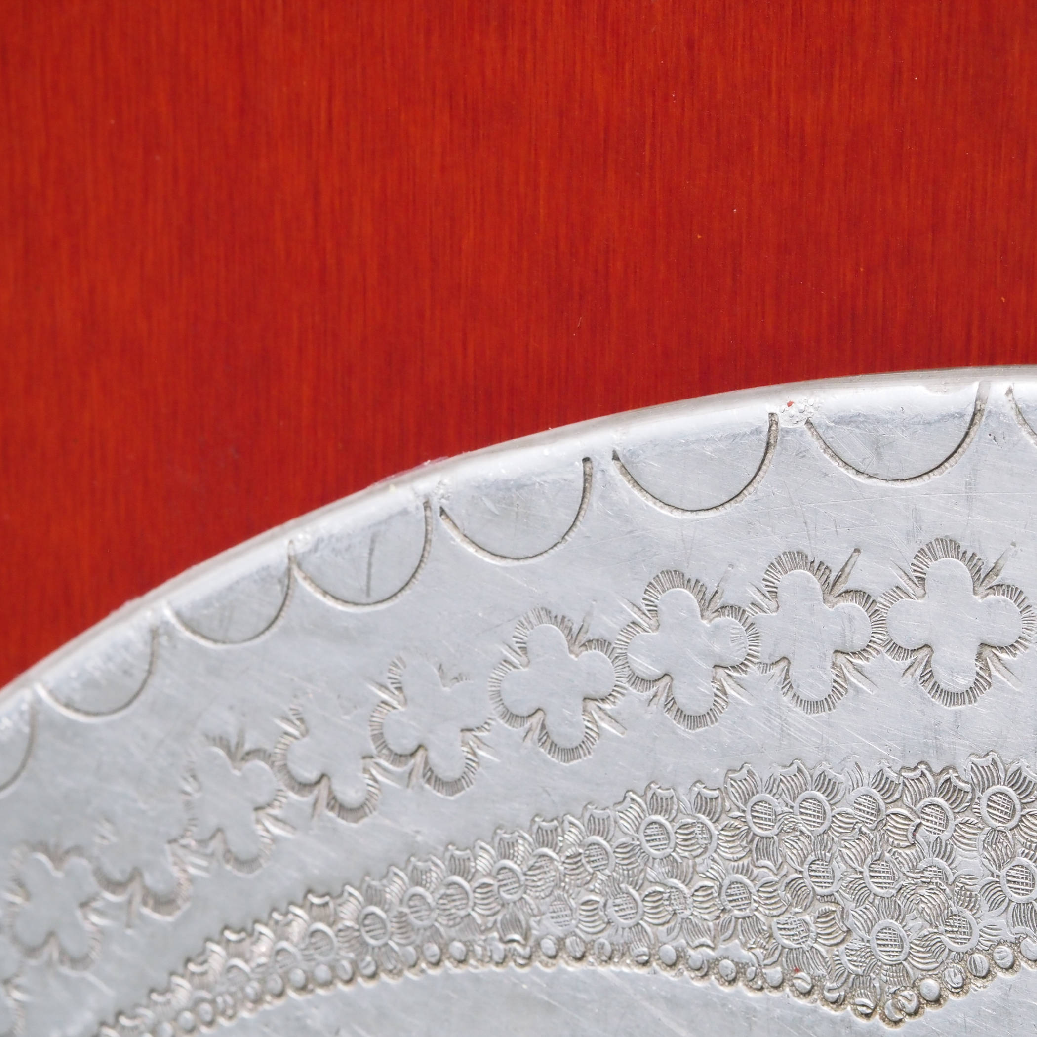 Large tabletop in laminated plywood with etched metallic ornaments
