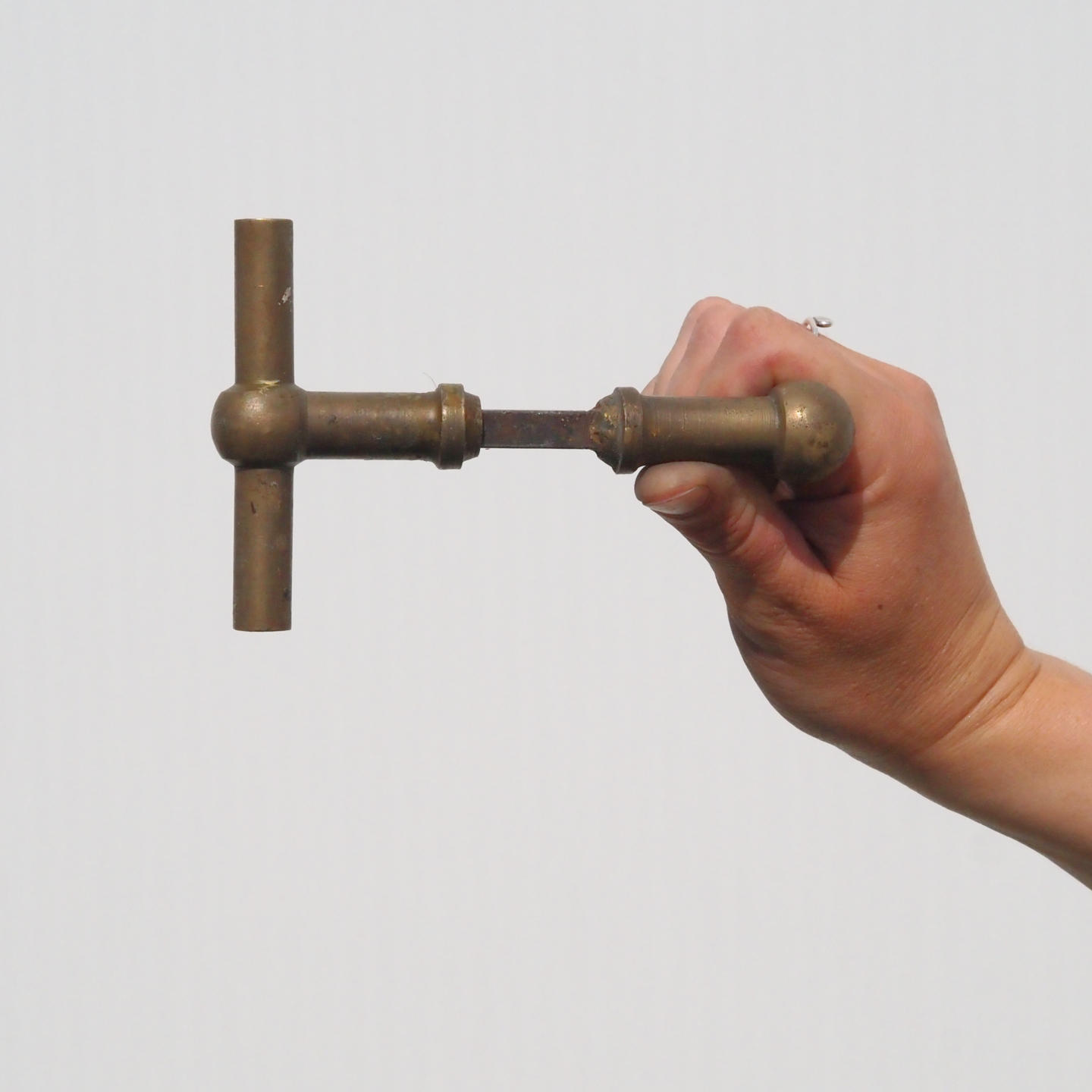 Door handle in solid brass