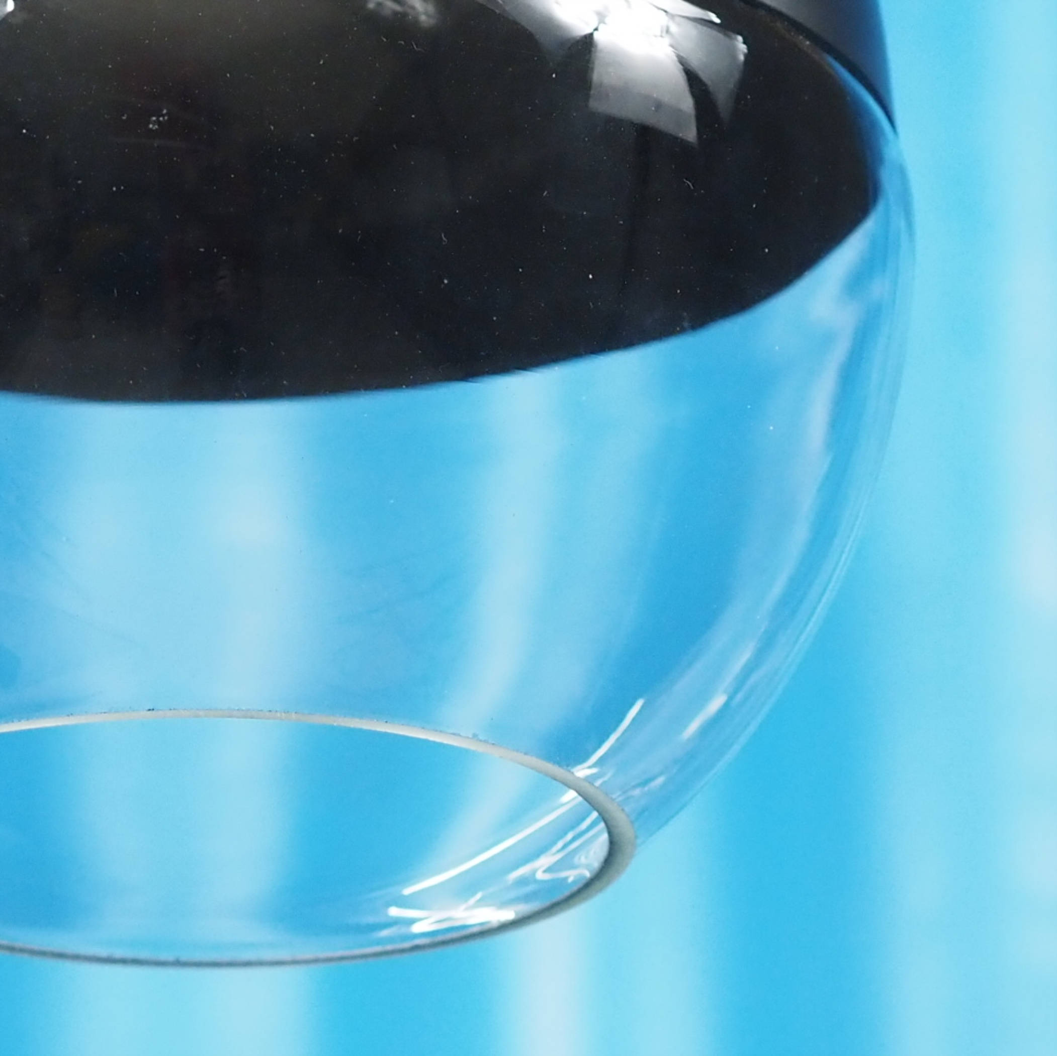 Hanging light in black plated steel with glass diffuser by Utilicht (⌀ 19 cm)