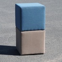 Square ottoman upholstered in grey or blue fabric